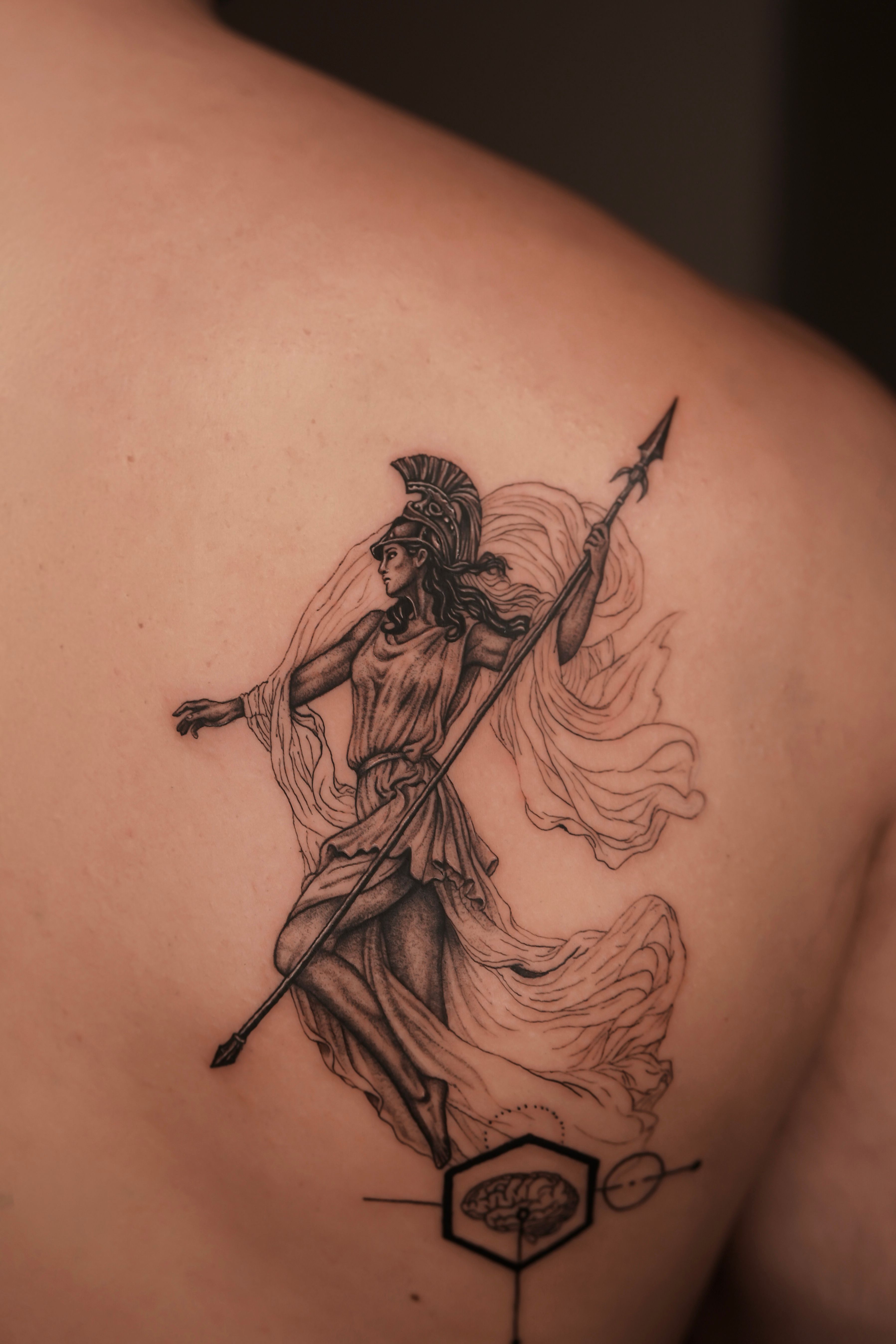Athena Greek mythology back tattoo in fineline style