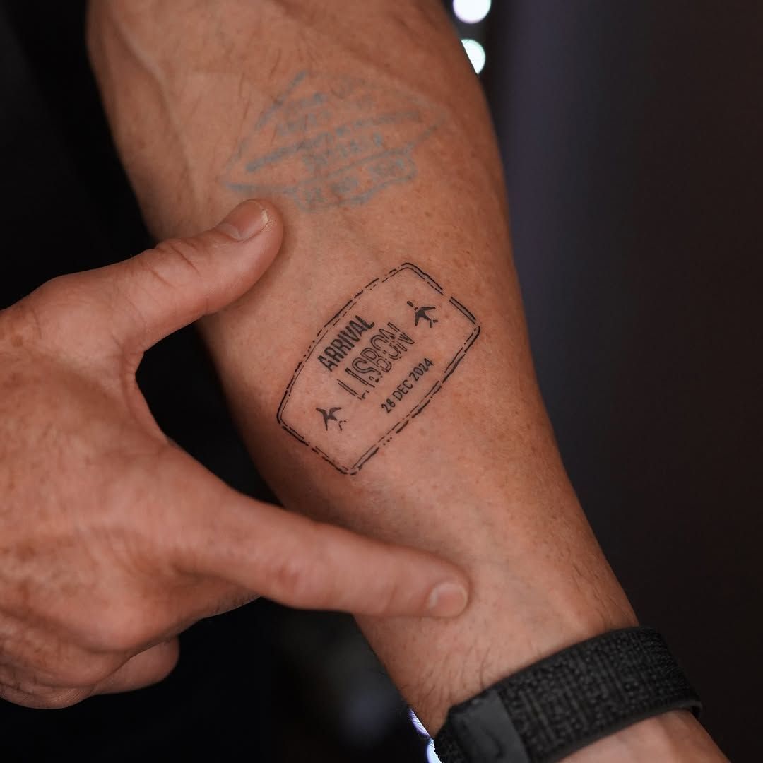 Lisbon arrival passport stamp minimalist tattoo