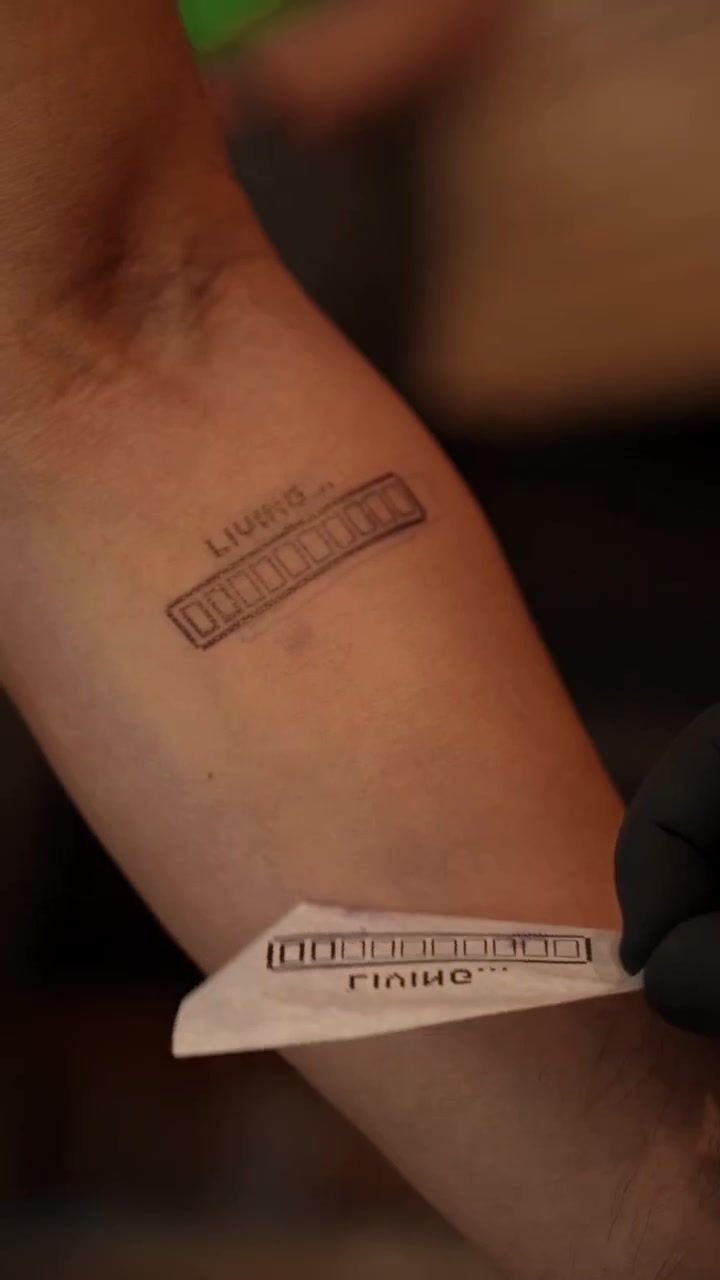 Living - The Loading Bar minimalist tattoo