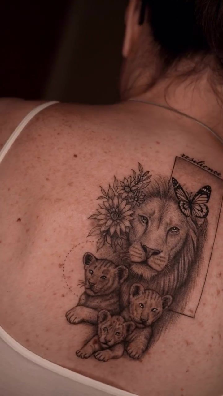 Lion family fine line realism back tattoo