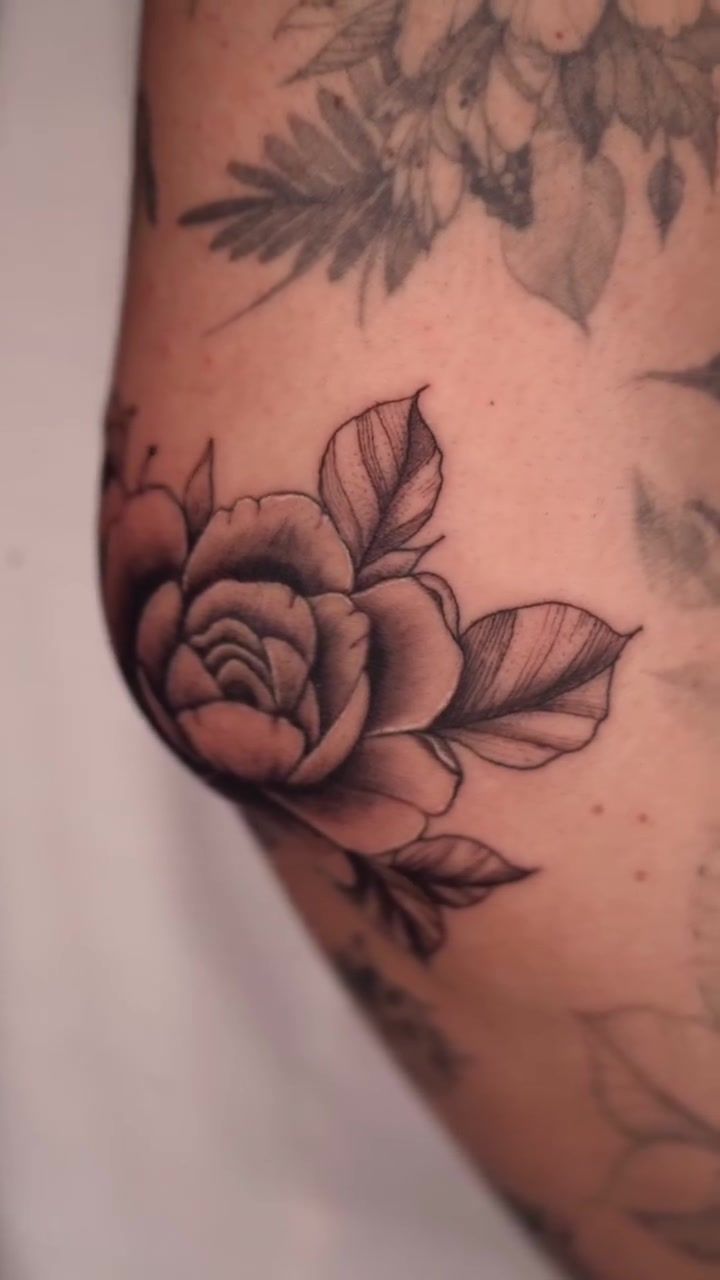 Rose on the elbow, part of a floral sleeve in progress showing botanical realism